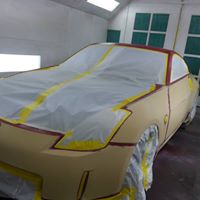 Iztapalapa Body Shop Logo