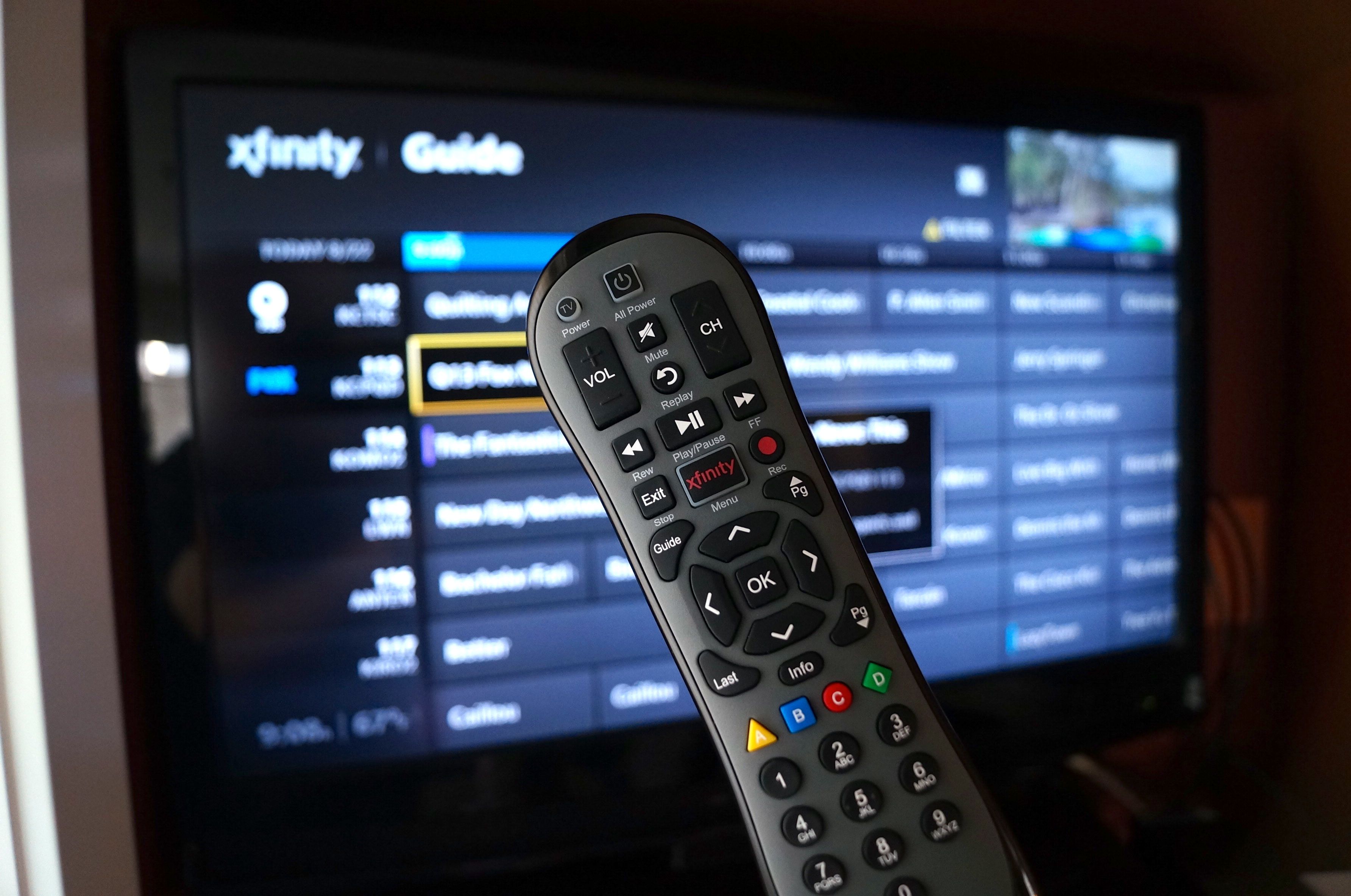 Xfinity Store By Comcast Logo