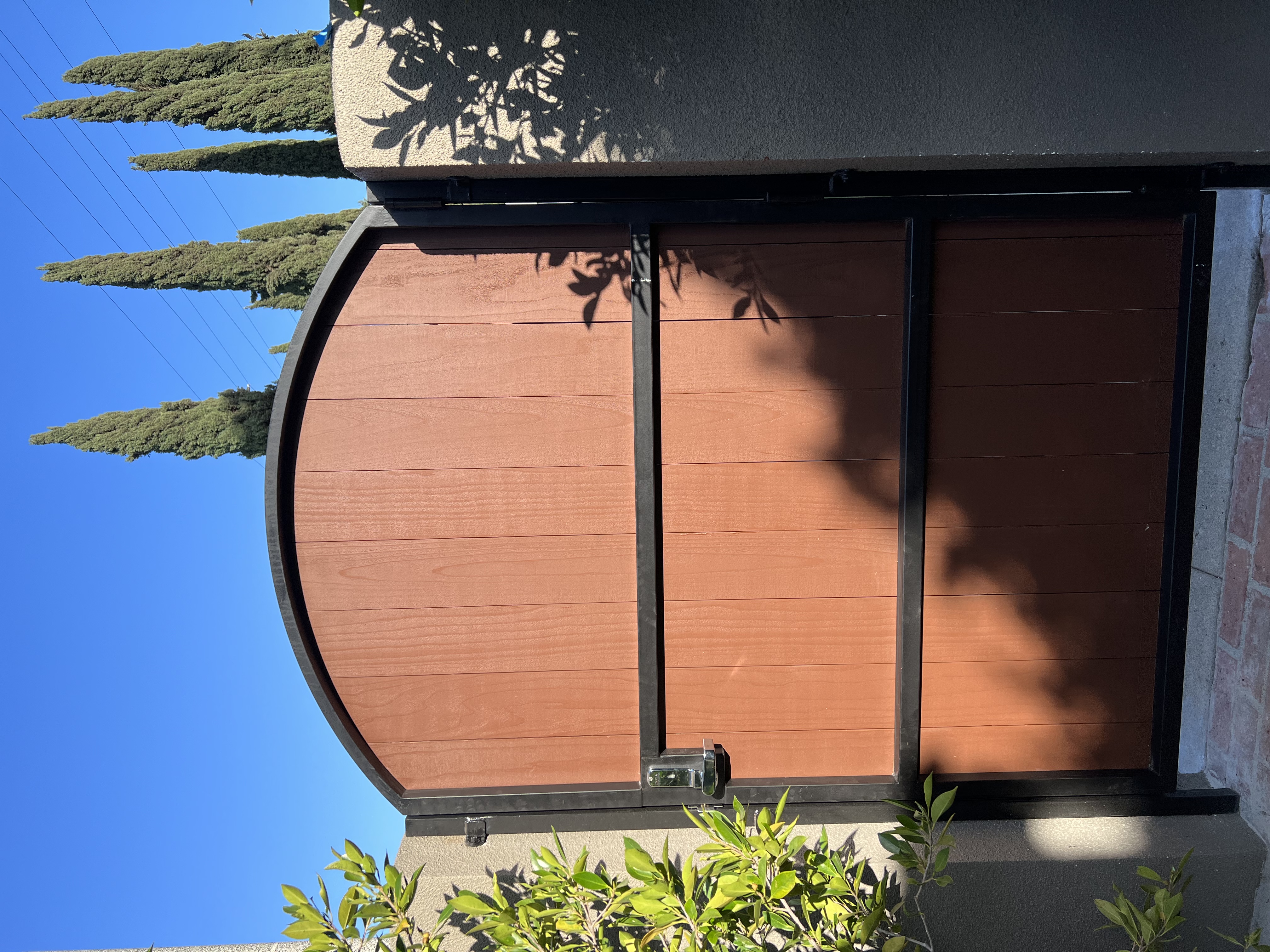 Culver City, Los Angeles Arch top wooden pedestrian gate with smart lock and steel frame