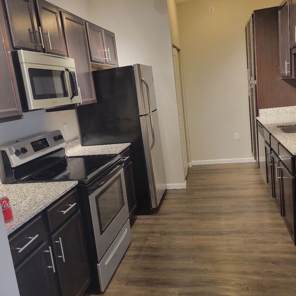 Alexis&apos; Housekeeping Logo