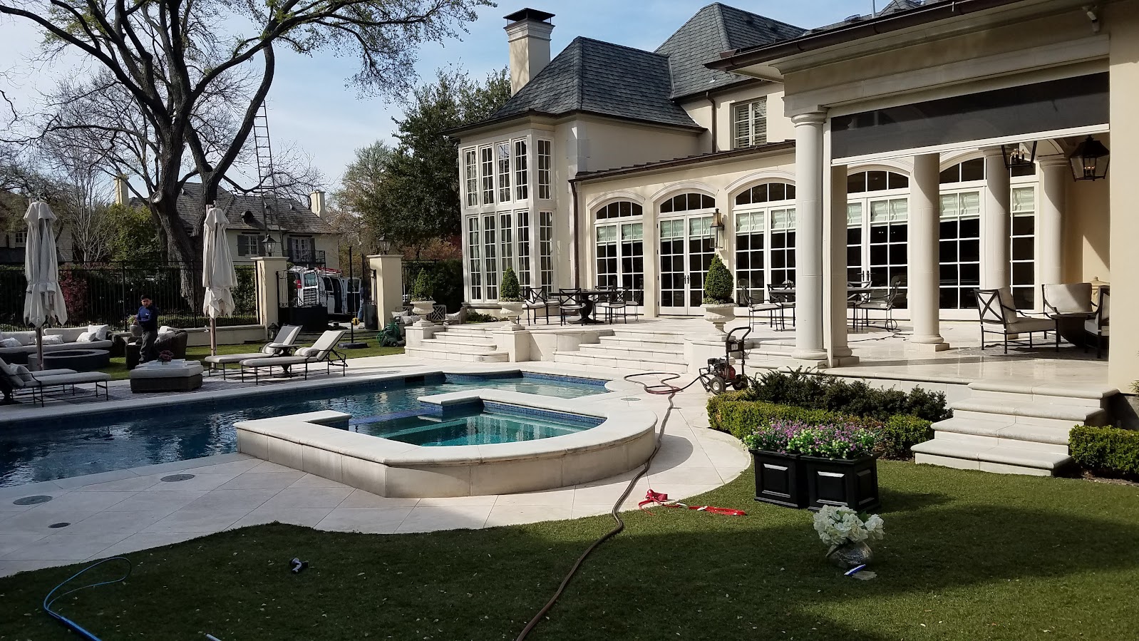 Power washing entire house including pool deck back yard area in highland park dallas texas, by house painting triforce