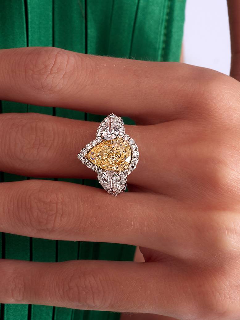 Pear shaped yellow diamond engagement ring